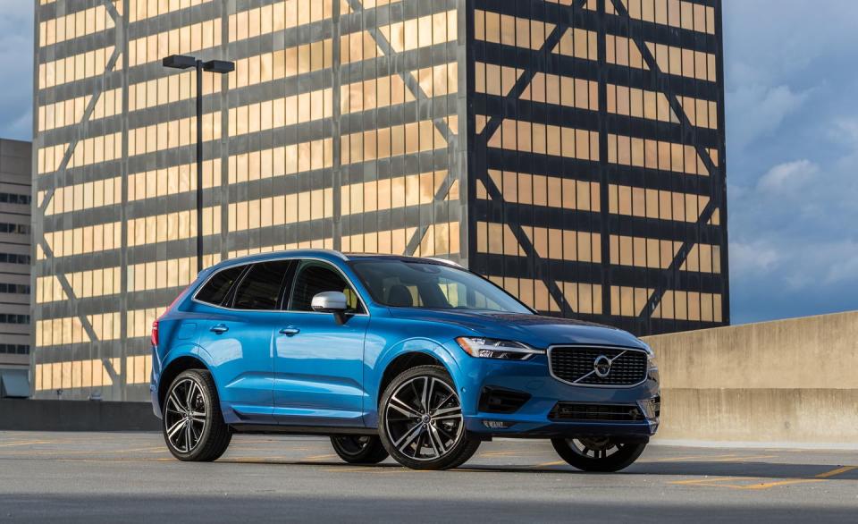 <p>Plus, the R-Design's exterior and interior styling makes it the sportier-looking XC60 with silver exterior mirror caps and window trim, a more aggressive front grille and bumper, aluminum interior trim, and unique black sport seats covered in leather and microsuede</p>