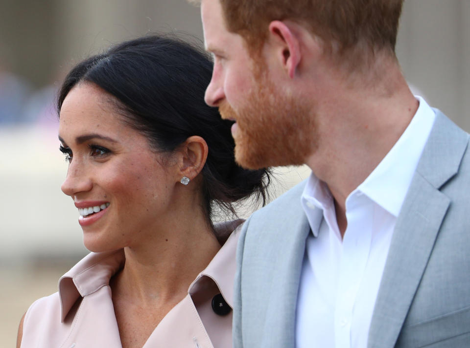 Meghan Markle and Prince Harry, the Duke and Duchess of Sussex, arriving at the Nelson Mandela Centenary Exhibition on Tuesday.  (Hannah Mckay / Reuters)