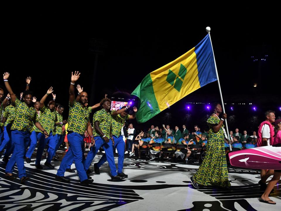 Athletes from Saint Vincent and the Grenadines make their entrance at the Summer Olympics.