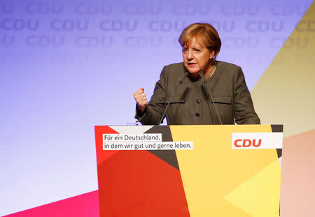 German Chancellor Angela Merkel, a top candidate of the Christian Democratic Union Party (CDU) for the upcoming general elections, speaks during an election rally in Hamburg, Germany, September 20, 2017. REUTERS/Morris Mac Matzen