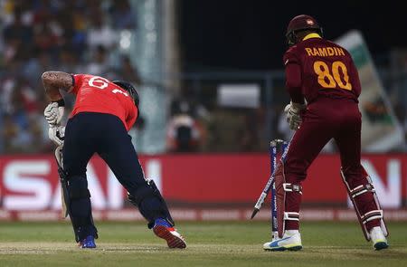 Cricket - England v West Indies - World Twenty20 cricket tournament final - Kolkata, India - 03/04/2016. England's Jason Roy (L) is bowled. REUTERS/Adnan Abidi