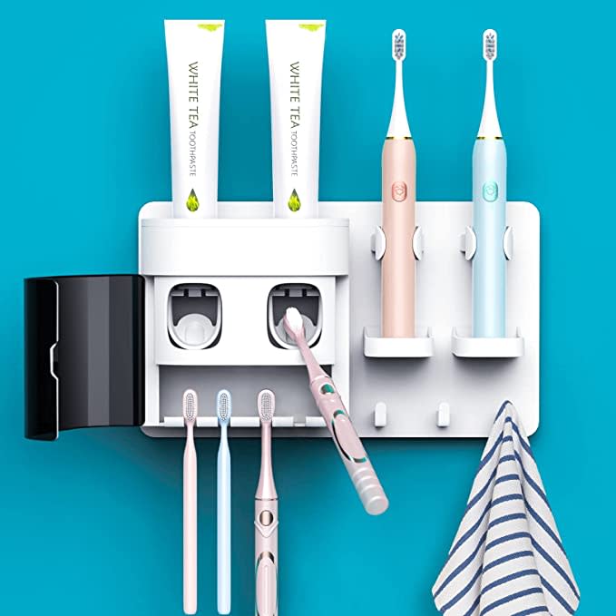 Toothpaste dispenser with double holders