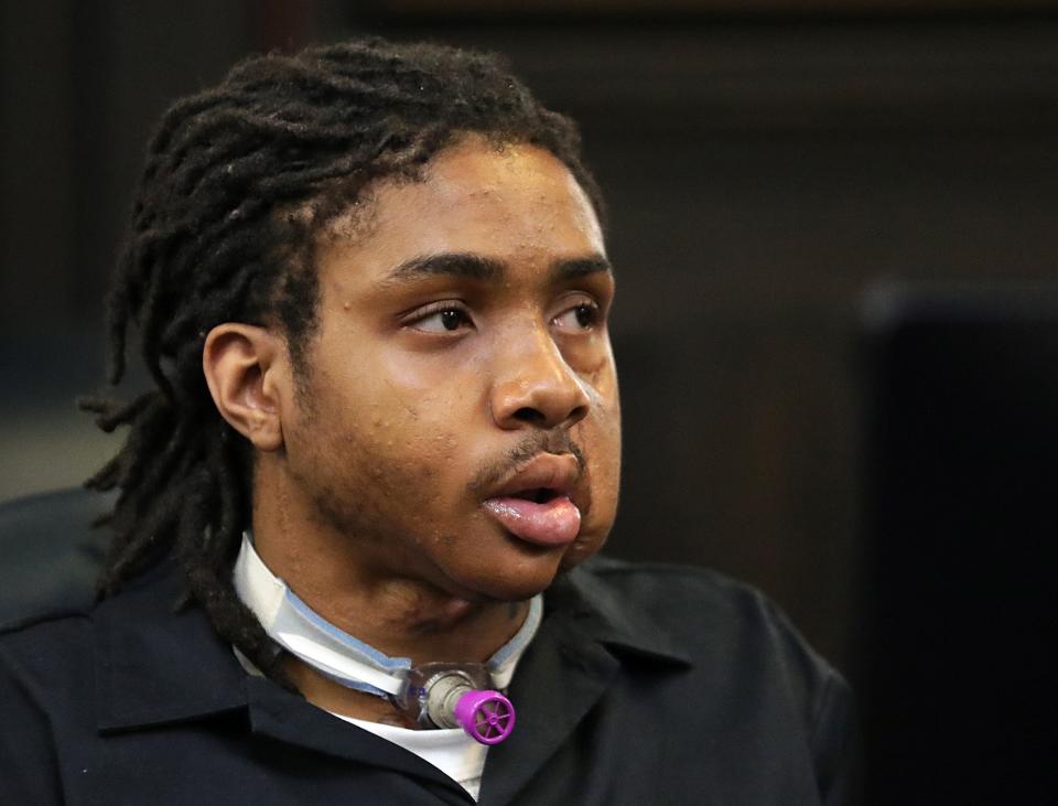 DeAngelo Preston listens Monday as Summit County Common Pleas Court Judge Kathryn Michael sentences him to 21 years to life in prison for the shooting death of Nykayla Lehman.