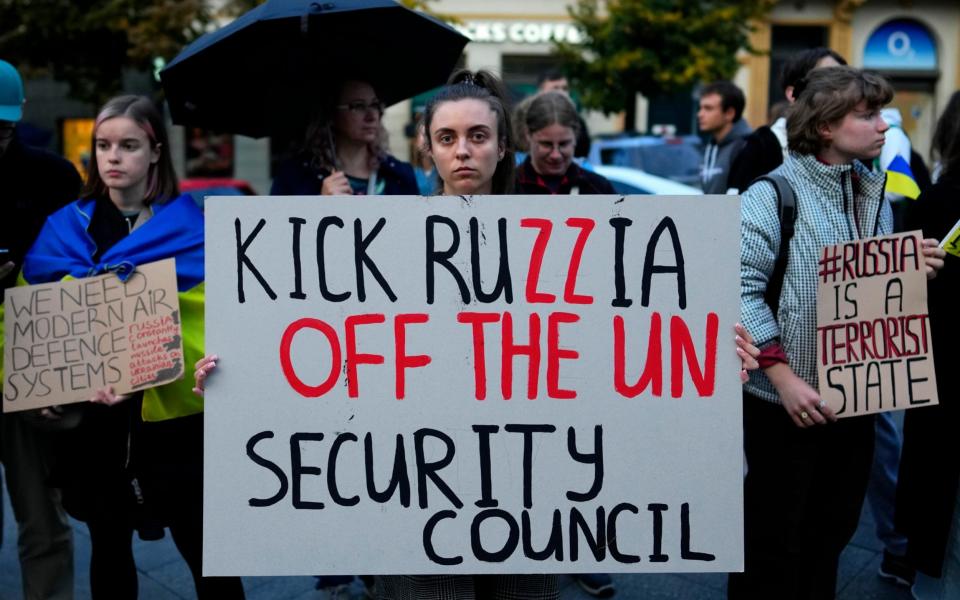 People gather for a protest in Prague, Czech Republic - AP