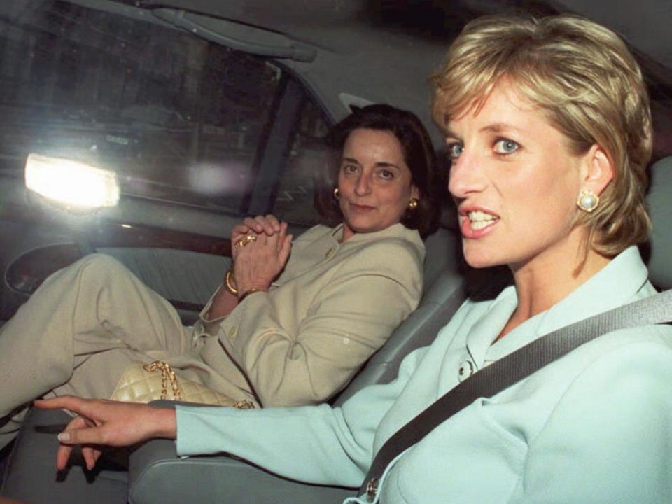 Britain's Princess of Wales and a friend identified as Lucia Flechia de Lima, are driven from Duke's Hotel in London Friday July 12 1996, following an announcement that the Princess and her husband, Prince Charles are to divorce. The Royal couple announced Friday that they have agreed on a swift divorce after three and a half years of separation and public sniping, and a decade or more of unhappiness.