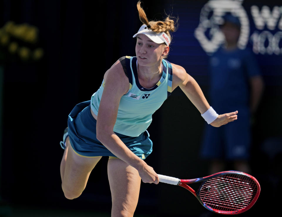 FILE - Elena Rybakina, of Kazakhistan, serves to Magdalena Frech, of Poland, during a match of the Dubai Duty Free Tennis Championships in Dubai, United Arab Emirates, Wednesday, Feb. 21, 2024. Rybakina is one of the top women’s tennis players at the 2024 French Open, which starts Sunday at Roland Garros in Paris. (AP Photo/Kamran Jebreili, File)