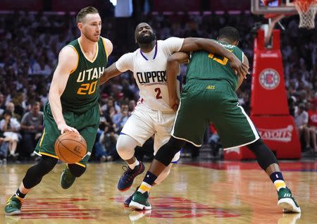 Apr 30, 2017; Los Angeles, CA, USA; Utah Jazz forward Derrick Favors (15) sets a screen on Los Angeles Clippers guard Raymond Felton (2) as Utah Jazz forward Gordon Hayward (20) drives to the basket in the second period of game seven of the first round of the 2017 NBA Playoffs at Staples Center. Mandatory Credit: Jayne Kamin-Oncea-USA TODAY Sports