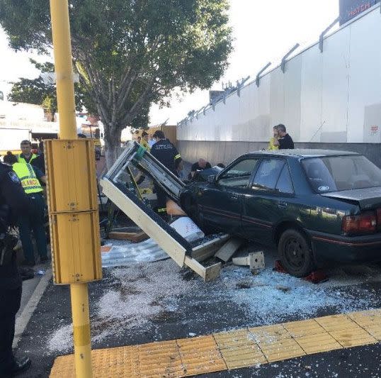 A car crashed into a bus stop in Brisbane. Source: @QldAmbulance