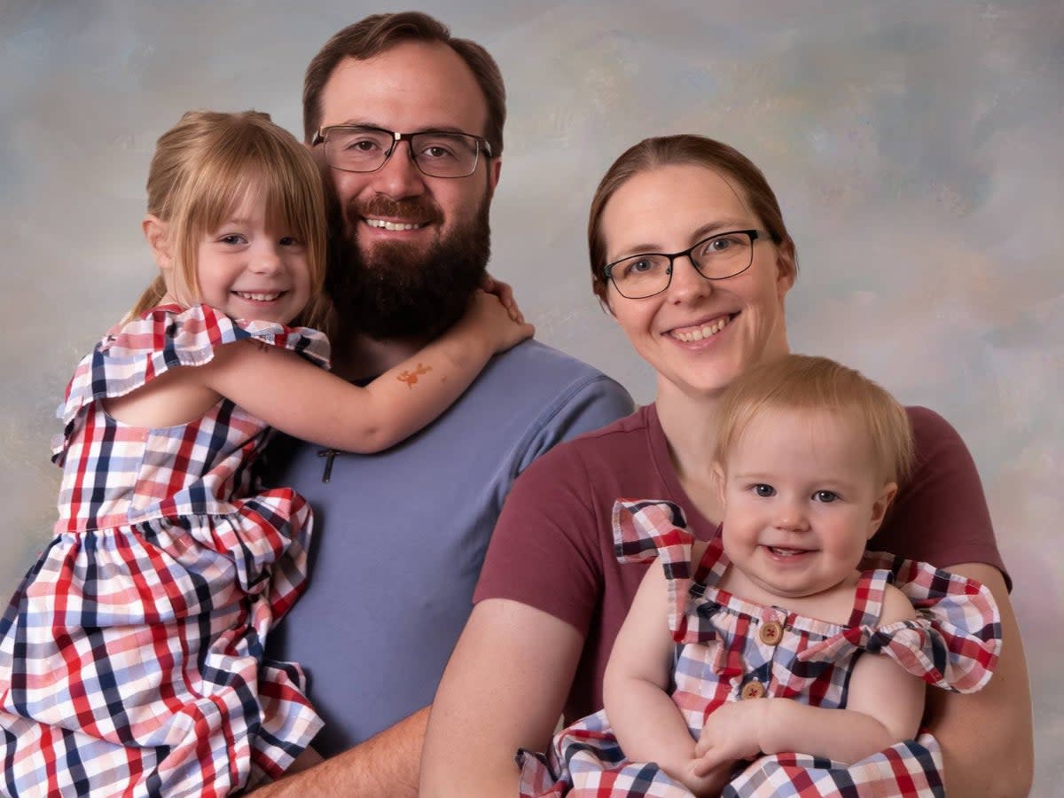 Nathan Morris, 35, with his wife and children (courtesy of St Michael Lutheran Church of Canton)