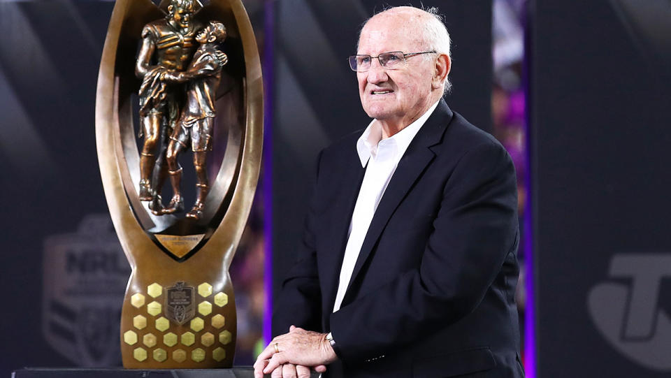 Arthur Summons, pictured here posing with The Provan-Summons Trophy after the 2017 NRL Grand Final.