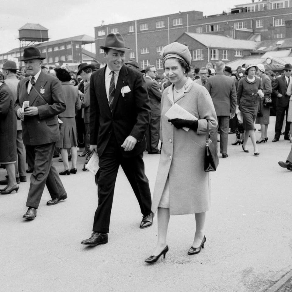 Lord Porchester and Queen Elizabeth | Roger Jackson/Central Press/Getty Images