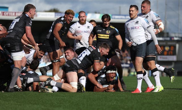 Greg Fisilau, bottom, scores Exeter’s second try