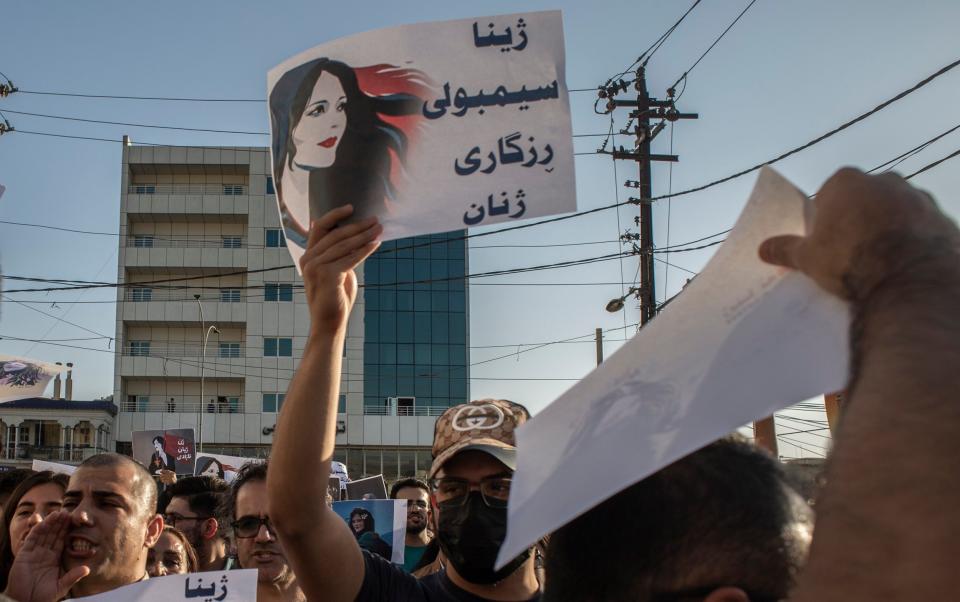 Protesters gather in Sulaimaniyah to protest the killing of Mahsa Amini - AP Photo/Hawre Khalid