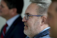 Andrew Wheeler, the EPA Administrator, listens as other officials speak about the rollback of the 2016 methane emissions rules to undo Obama-era rules designed to limit greenhouse gas emissions from oil and gas fields and pipelines at the Energy Innovation Center Thursday, Aug. 13, 2020, in Pittsburgh. (AP Photo/Keith Srakocic)