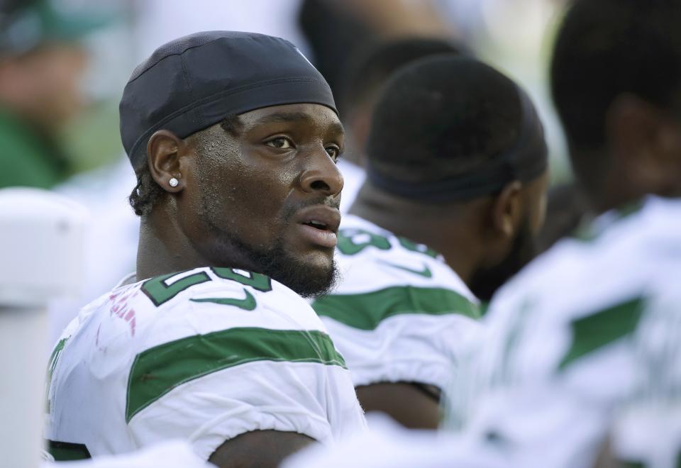 File-This Sept. 22, 2020, file photo shows New York Jets running back Le'Veon Bell watching from the sideline near the end of the second half of an NFL football game against the New England Patriots, in Foxborough, Mass. The New York Jets have surprisingly released Bell, ending a disappointing tenure after less than two full seasons. The team issued a statement from general manager Joe Douglas on Tuesday, Oct. 13, 2020, in which he says the Jets made the move after having several conversations with Bell and his agent during the last few days and exploring trade options. (AP Photo/Steven Senne, File)