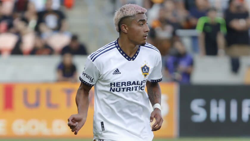 Los Angeles Galaxy defender Julian Araujo during the second half of an MLS soccer match against the Houston Dynamo Sunday, Oct. 9, 2022, in Houston. (AP Photo/Michael Wyke)