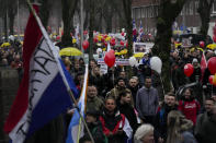 Thousand of demonstrators march in Utrecht, Netherlands, Saturday, Dec. 4, 2021, to protest against COVID-19 restrictions and the lockdown. (AP Photo/Peter Dejong)