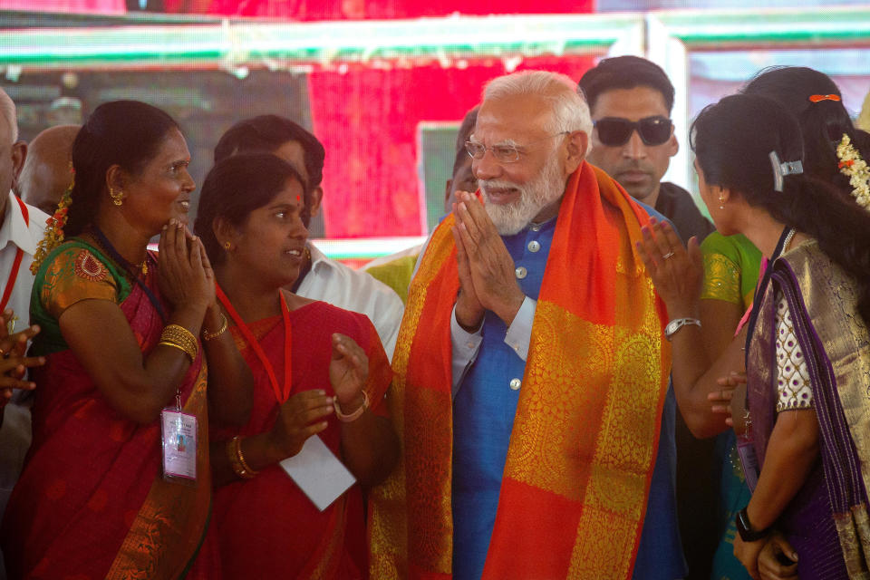 India's Prime Minister Narendra Modi greets women during an election campaign rally, April 14, 2024, in Mysuru, India. / Credit: Abhishek Chinnappa/Getty