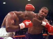 <p>Mike Tyson and Evander Holyfield exchange punches during their WBA Heavyweight match Saturday, June 28, 1997, at the MGM Grand in Las Vegas. The fight was stopped after Tyson bit Holyfield on each ear during the third round. Tyson was disqualified and Holyfield retained his title. (AP Photo/Lenny Ignelzi) </p>