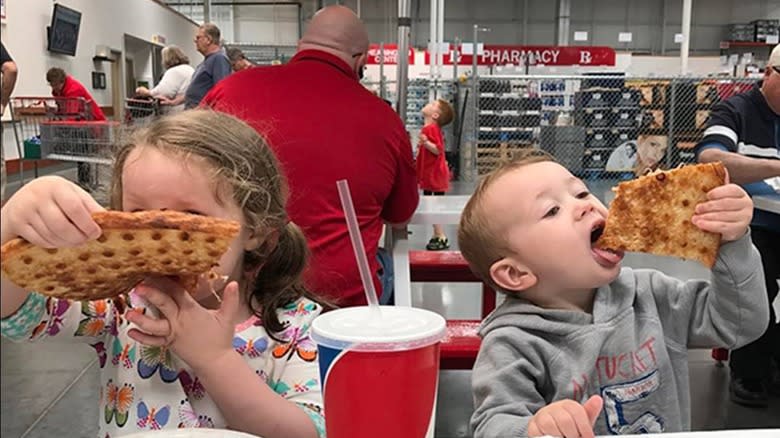 kids eating pizza at Costco 