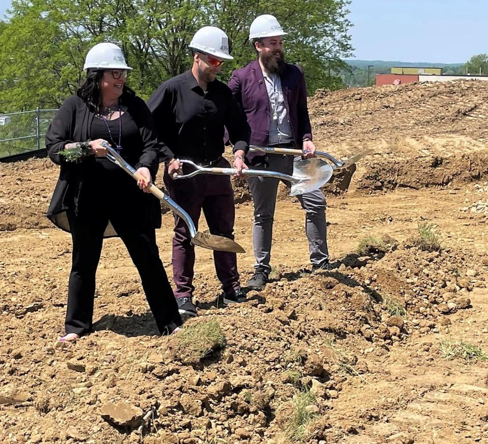 Michelle Turner Ganz, Noah Turner and Cole Moody break ground for a new Dean's Jewelry store in Mount Vernon. It will be larger than their current shop opened in 2007.