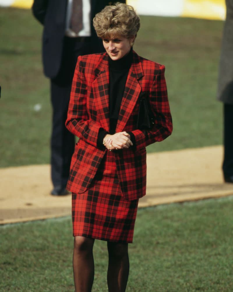 Her red and black tartan tailored two-piece set