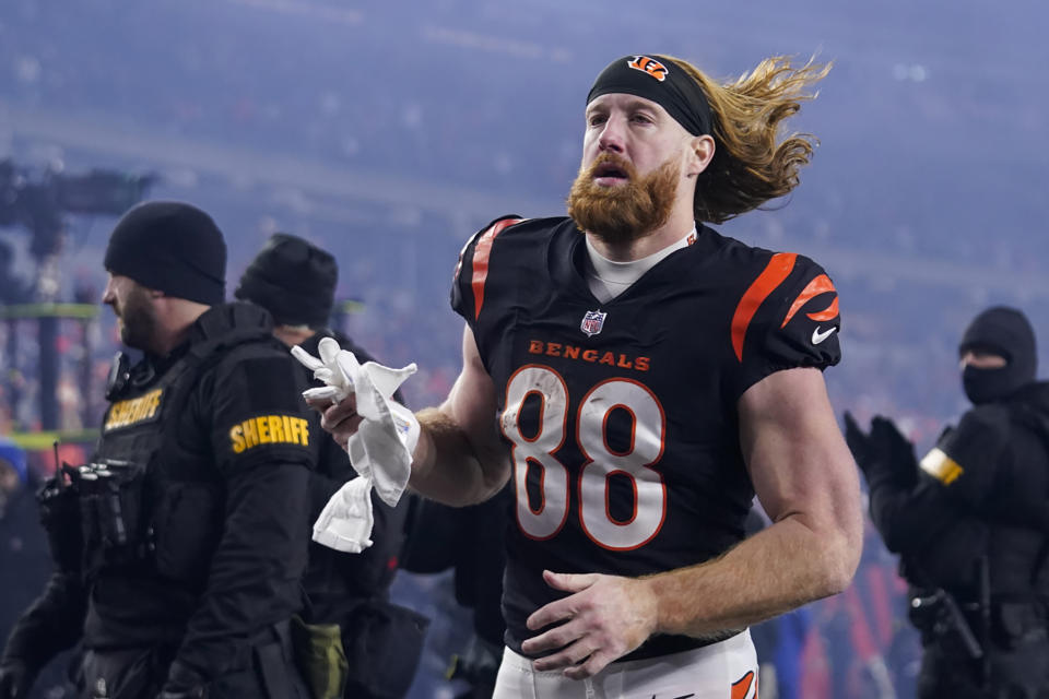 FILE - Cincinnati Bengals tight end Hayden Hurst (88) walks off the field following a wild-card playoff NFL football game against the Baltimore Ravens, Monday, Jan. 16, 2023, in Cincinnati. The Carolina Panthers have added a much-needed pass-catching tight end for their incoming rookie quarterback. The Panthers agreed to terms with former Cincinnati Bengals tight end Hayden Hurst on a three-year contract, according to a person familiar with the situation. The person spoke to The Associated Press on condition of anonymity Wednesday, March 15, 2023. (AP Photo/Jeff Dean, File)