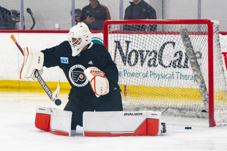 Philadelphia Flyers' Ivan Fedotov takes to the ice for some NHL hockey practice following his introductory press conference, Friday, March 29, 2024, in Voorhees, N.J. (AP Photo/Chris Szagola)