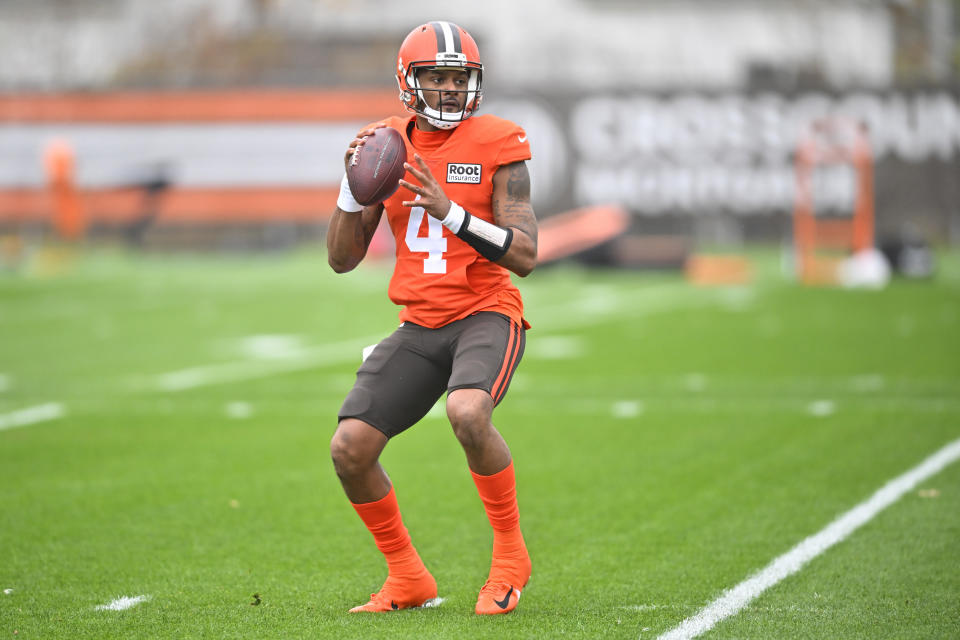 Cleveland Browns quarterback Deshaun Watson looks to throw a pass during an NFL football practice at the team's training facility Wednesday, Nov. 16, 2022, in Berea, Ohio. (AP Photo/David Richard)