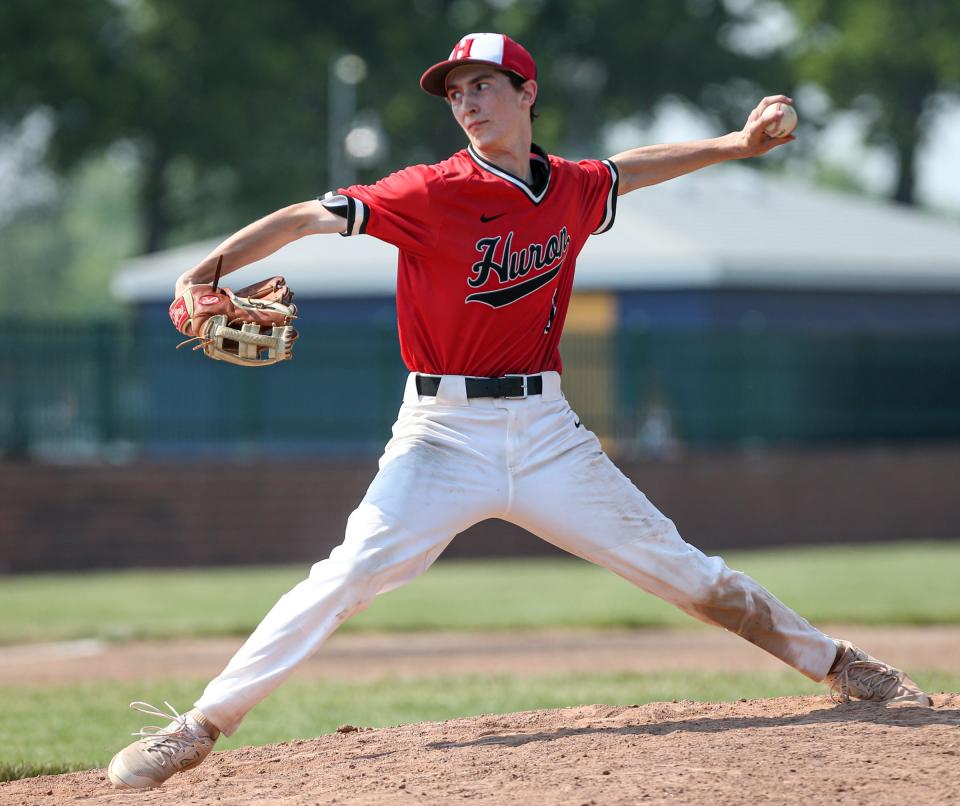 New Boston Huron's Kyle Kantola pitches against Airport in the finals of the División 2 District at Airport Saturday. Huron won 4-1 in 10 innings.