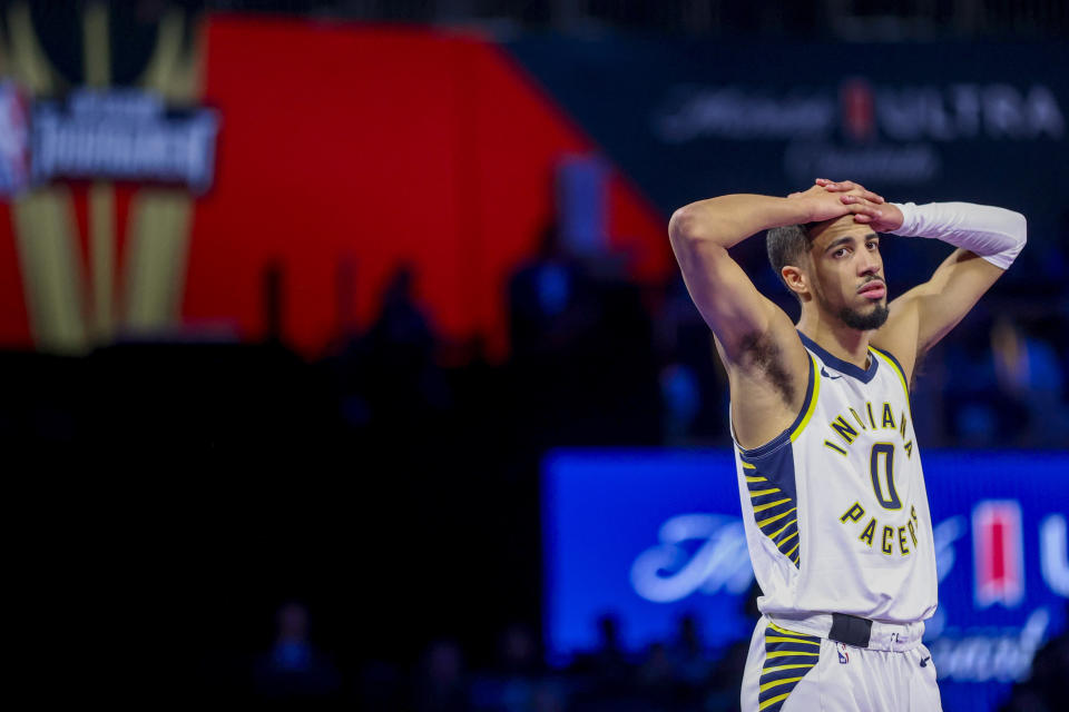 Indiana Pacers guard Tyrese Haliburton (0) reacts after a play against the Los Angeles Lakers during the second half of the championship game in the NBA basketball In-Season Tournament on Saturday, Dec. 9, 2023, in Las Vegas. (AP Photo/Ian Maule)