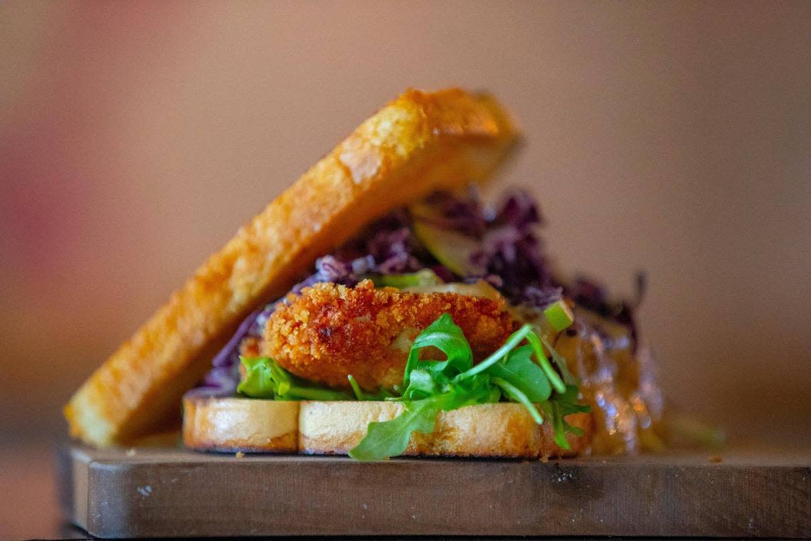 The Chicken Schnitzel Sandwich is on the menu at German-isch, the food concept inside District 7 Social. Ryan C. Hermens