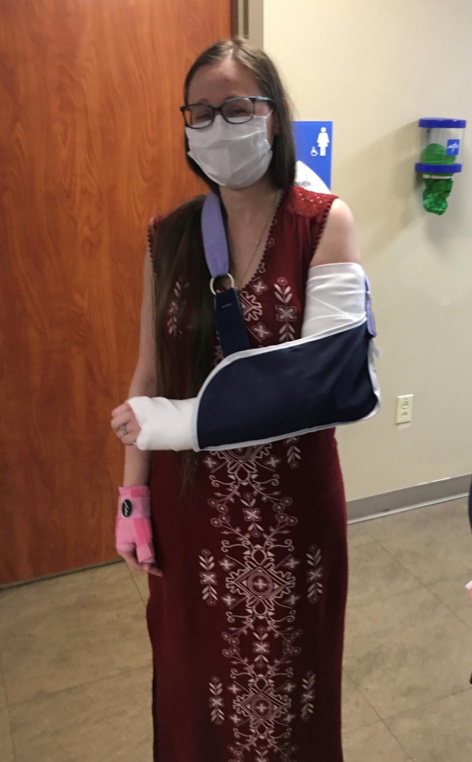 Kindergarten teacher Rachel Davis at Ascension Saint Thomas Midtown hospital after getting a cast on her left arm May 11, 2022, the day she tackled an intruder in her school and broke her left arm