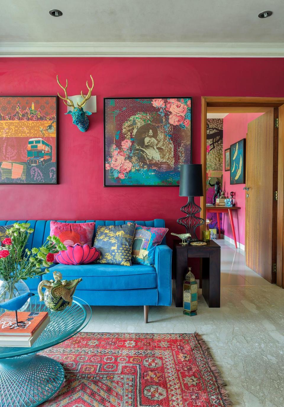 Another view of the living area, illustrating how hot and cold shades play off each other across walls, furniture, furnishings and artwork.