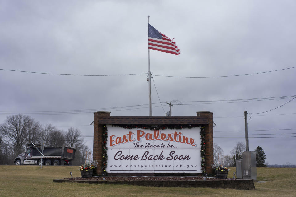 A sign that reads "East Palestine The Place to Be Come Back Soon," is seen at the edge of East Palestine, Ohio, on Monday, Jan.29, 2024. Daily life largely returned to normal for residents of East Palestine, Ohio, months after a Norfolk Southern train derailed and spilled a cocktail of hazardous chemicals that caught fire a year ago, but the worries and fears are always there. (AP Photo/Carolyn Kaster)(AP Photo/Carolyn Kaster)