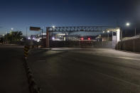 A view of the border bridge in Ciudad Acuna, Mexico, Friday evening, Sept. 24, 2021, across the Rio Grande river from Del Rio, Texas. (AP Photo/Felix Marquez)