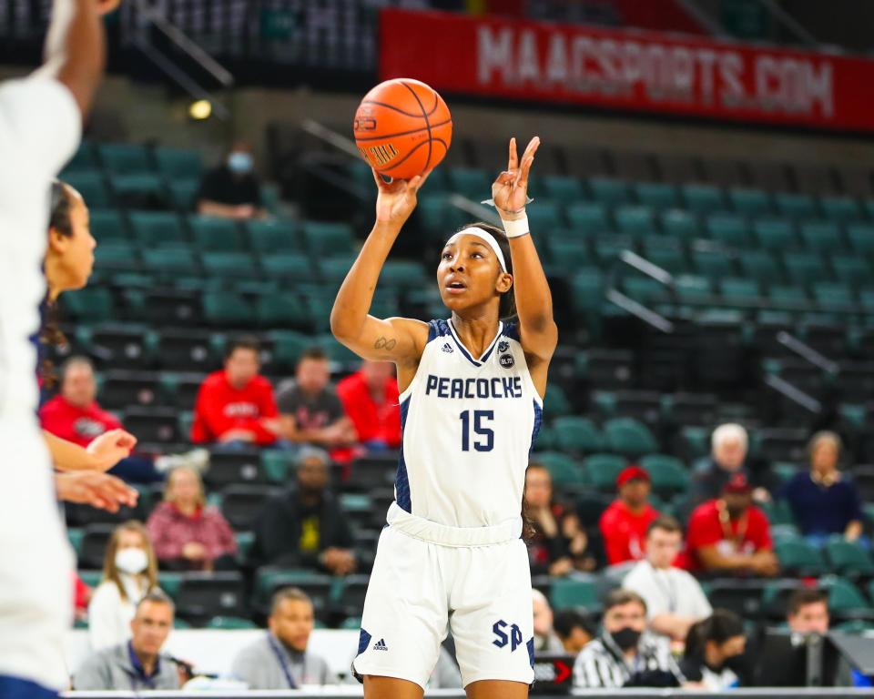 Sky Castro of Saint Peter's attempts a shot against Marist in a Metro Atlantic first-round playoff game. Castro grabbed 19 rebounds and scored nine points. Saint Peter's prevailed 49-29. METRO ATLANTIC ATHLETIC CONFERENCE