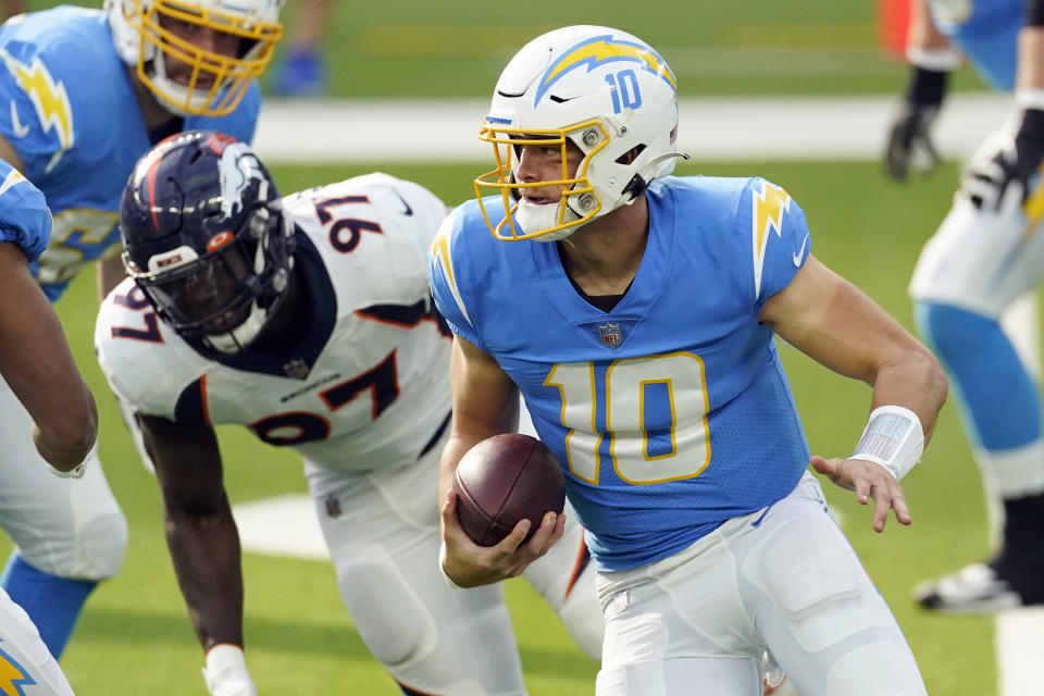 Justin Herbert won the NFL's offensive rookie of the year award. (AP Photo/Ashley Landis)