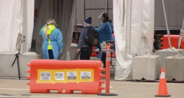 After pedestrians cross into Canada, they are escorted into a tent, shown here at the Rainbow Bridge in Niagara Falls. There they are screened and told about COVID-19 protocols.   