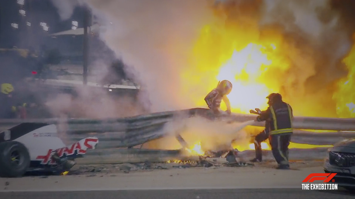 Romain Grosjean miraculously pulls himself from the wreckage (F1 Exhibition)