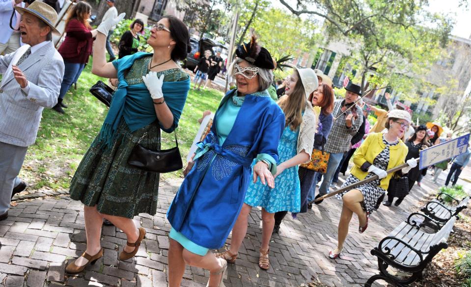 Flannery O'Connor enthusiasts parade around Lafayette Square celebrating the author who grew up in a home on the square.