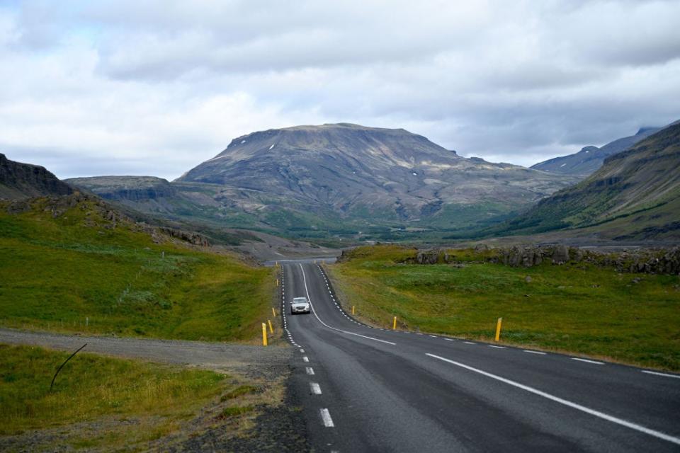 Driving down a road in Iceland