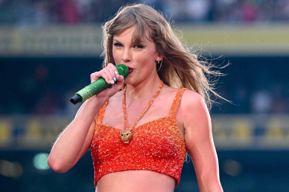 <p>Charles McQuillan/TAS24/Getty</p> Taylor Swift singing at Aviva Stadium on June 28, 2024 in Dublin, Ireland