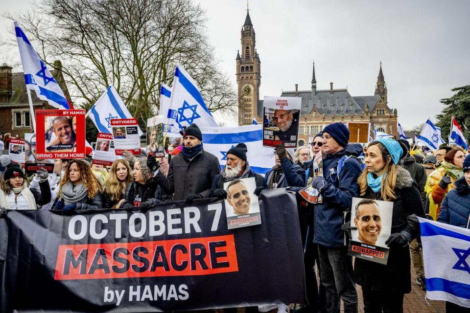 Pro-Israel demonstrators take part in a protest outside the court building at The Hague on 11 January (ANP/AFP/Getty)