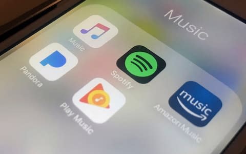 Classical music fans say computer algorithms of streaming platforms such as Spotify and Apple are biased in favour of pop, rock and dance music - Credit: Jenny Kane/AP