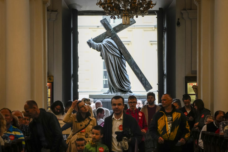 Polish families take part in a Catholic Mass concluding the March for Life and Family, an annual march against abortion and in support of conservative values, in Warsaw, Poland, on Sunday June 18, 2023. Parents of trans children are mobilizing in Poland seeking acceptance after the country’s leader mocked trans people last year during Pride season. Poland has been ranked as the worst country in the European Union for LGBTQ+ rights.(AP Photo/Czarek Sokolowski)