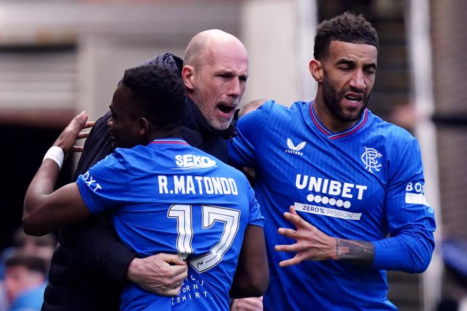 Rangers manager Philippe Clement congratulates Rabbi Matondo on his injury-time equaliser against Celtic at Ibrox today with Connor Goldson <i>(Image: PA)</i>