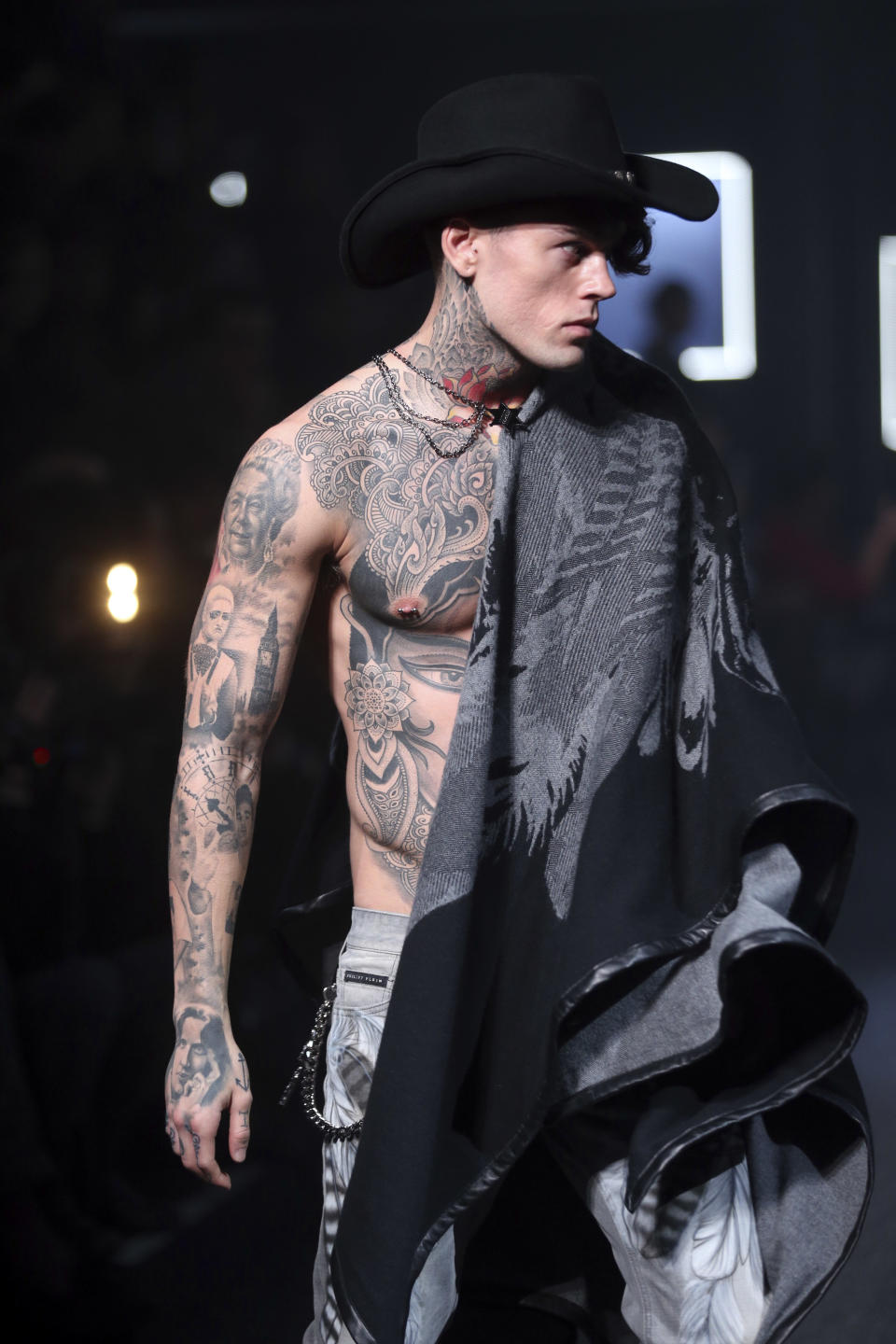 A model wears a creation for Philipp Plein men's Fall-Winter 2014 collection, part of the Milan Fashion Week, unveiled in Milan, Italy, Sunday, Jan. 12, 2014. (AP Photo/Luca Bruno)