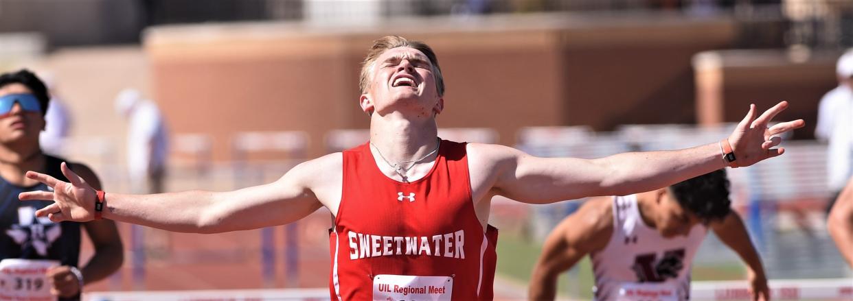 Sweetwater senior Harrison Foster celebrates after winning the 300 hurdles at the Region I-4A track and field meet Saturday at Lowrey Field in Lubbock. He also won the 110 hurdles earlier in the day to make it a clean sweep in the hurdle events.