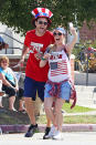 <p>The parents-to-be celebrated the Fourth of July by running an L.A. fun run. Of course, they took photos! (Photo: Mr Plow/BACKGRID) </p>